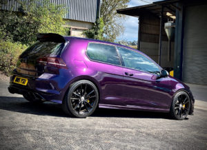 Side view of a purple Golf R