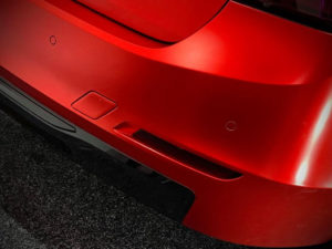 3 Series Satin Red - close-up of the back of the car